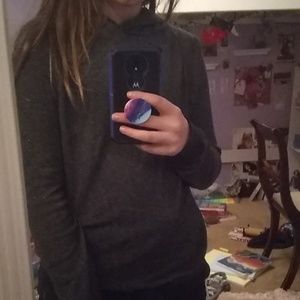 A dark hoodie with no pockets.